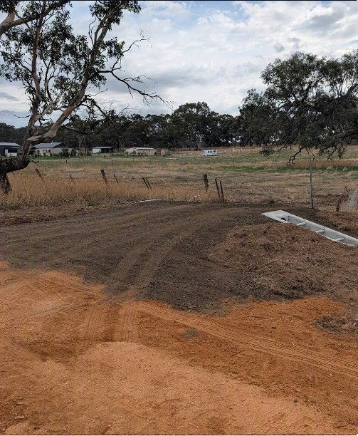 Completed rural crossover with the culvert covered and the access formed to the property
